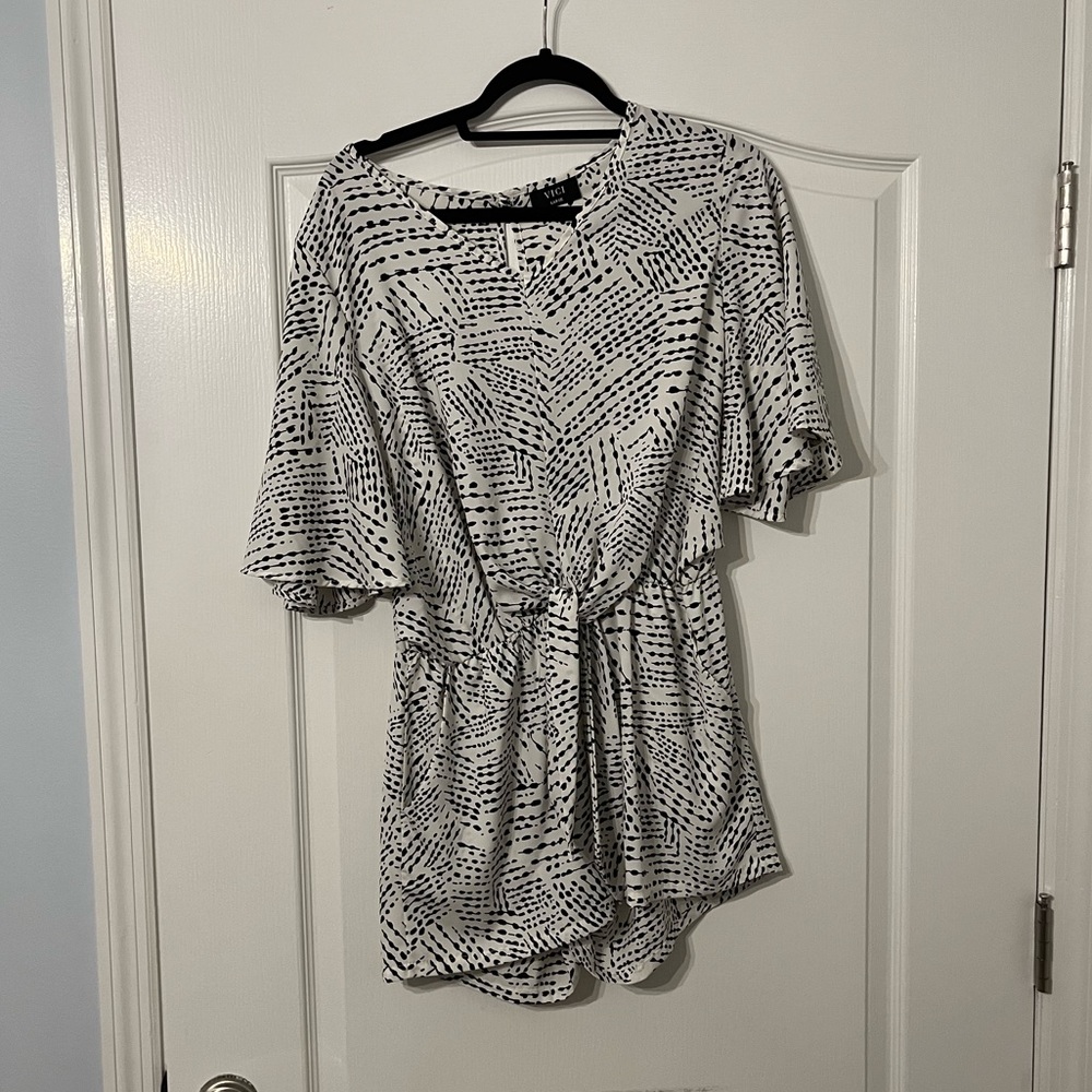 VICI romper with open crossover back